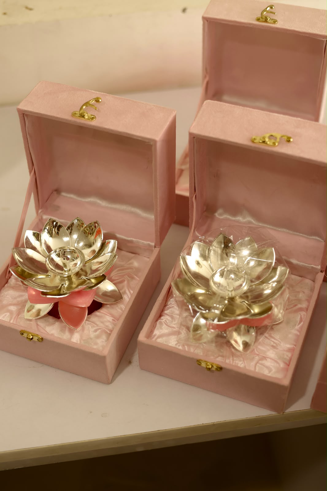 Metal gifting diya
